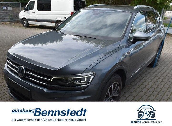 Platinum grey metallic Gebraucht 2018 VW Tiguan Allspace Comfortline SUV | 24.240 € (Guter Preis) - Bild 1/3
