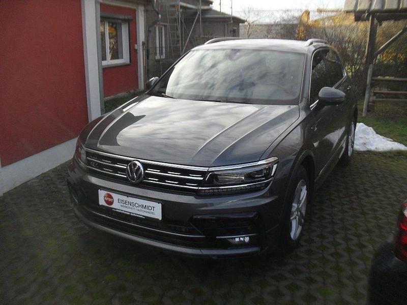 Indiumgrau Gebraucht 2017 VW Tiguan R-line SUV | 25.885 € (Fairer Preis) - Bild 1/4