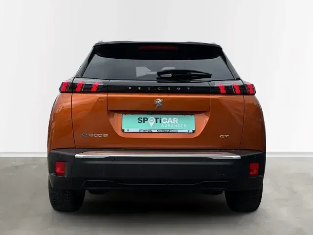 Gebraucht Peugeot e-2008 GT 100 kW (136 PS) 2023 Orange fusion (metallic) SUV