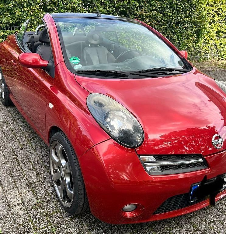 Rot Gebraucht 2006 Nissan Micra C+C Premium Edition Cabrio | 1.400 € (Guter Preis) - Bild 1/4