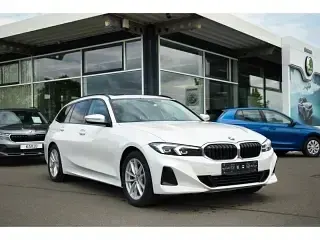 Gebraucht BMW 318 150 PS (110 kW) 2023 Mineralweiss metallic Kombi