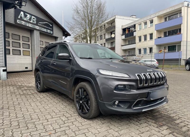 Grau Gebraucht 2015 Jeep Cherokee Limited SUV | 18.499 € (Teuer) - Bild 1/4