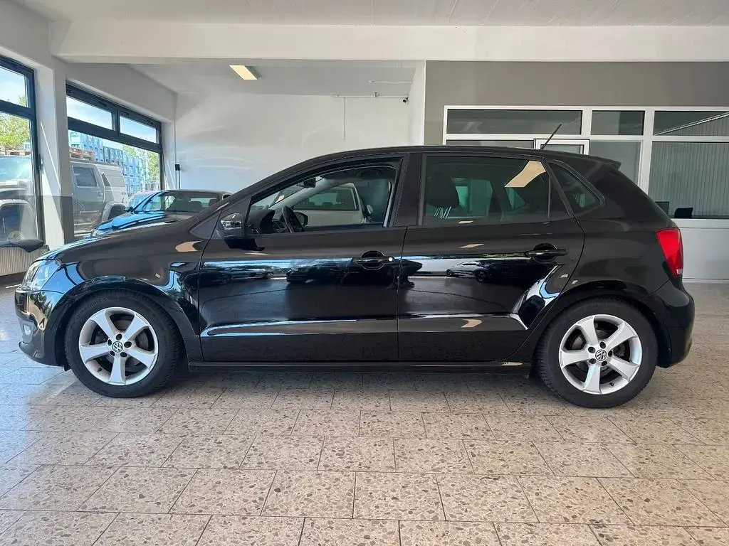 Gebraucht VW Polo Team 105 PS (77 kW) 2011 Schwarz Kleinwagen