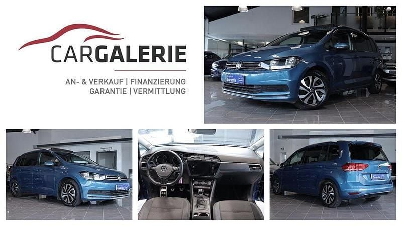 Caribbean blue metallic Gebraucht 2021 VW Touran Van / Kleinbus | 20.950 € (Guter Preis) - Bild 1/4