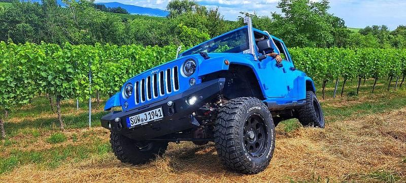 Blau Gebraucht 2019 Jeep Wrangler Sahara SUV | 44.500 € (Teuer) - Bild 1/4