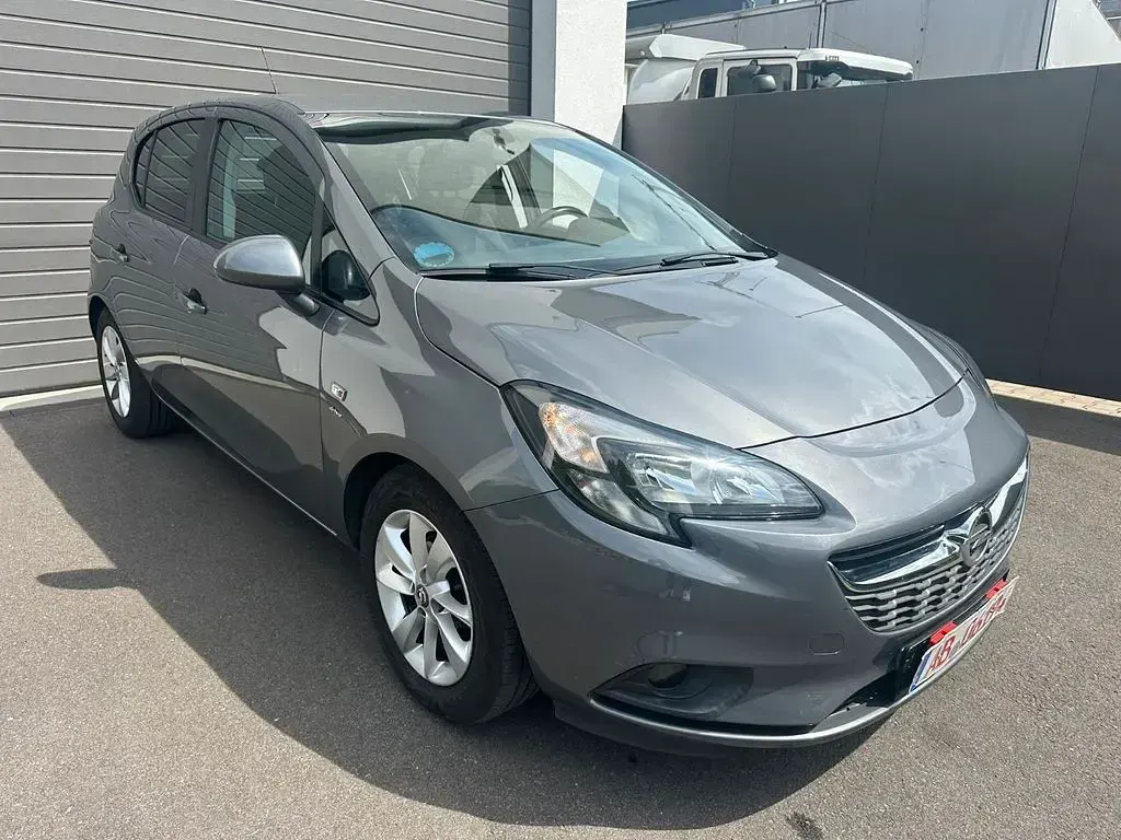 Używany Opel Corsa drive 90 KM (66 kW) 2015 Szary Hatchback