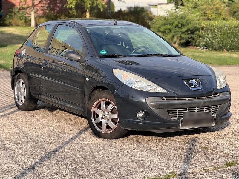 Gebraucht Peugeot 206+ 60 PS (44 kW) 2011 Schwarz Kleinwagen