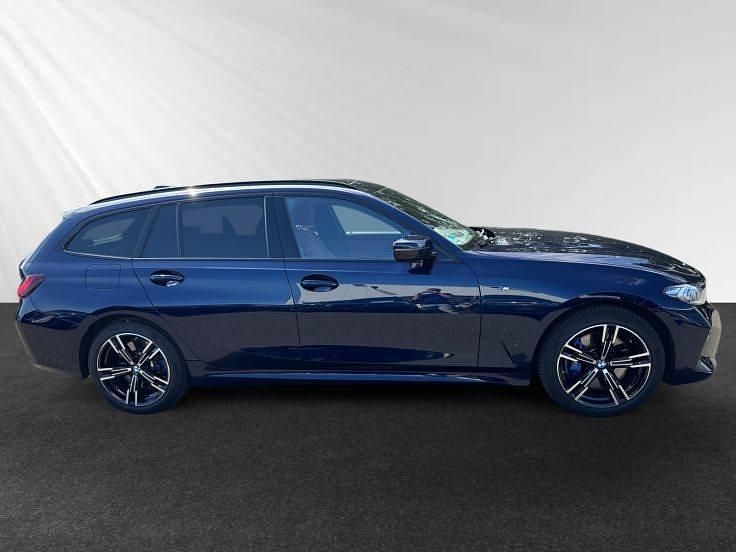Gebraucht BMW 330e M Sport 292 PS (214 kW) 2024 Bmw individual tansanitblau metallic Kombi