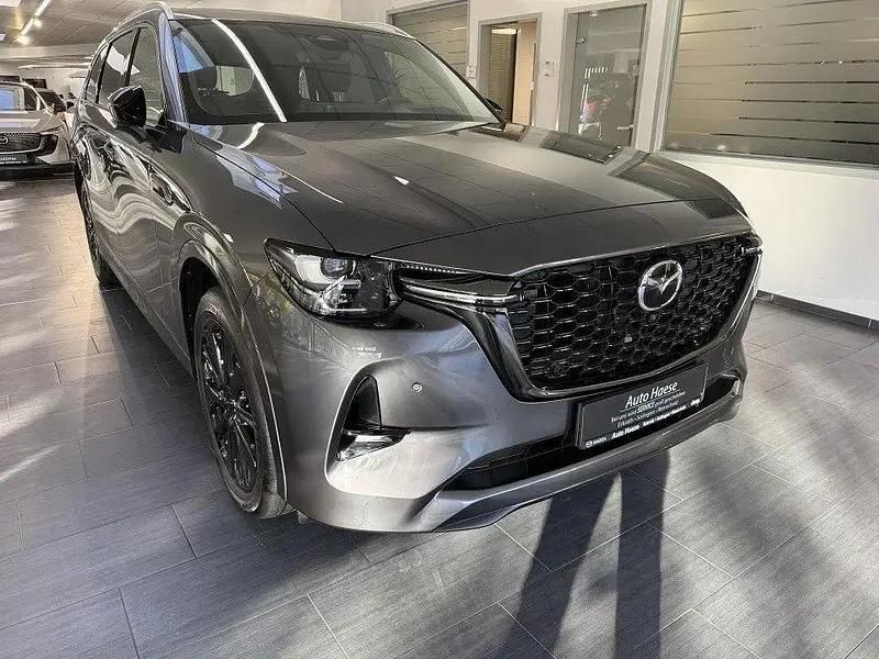 Grau Gebraucht 2024 Mazda CX-80 Homura-Line SUV | 55.990 € (Guter Preis) - Bild 1/4