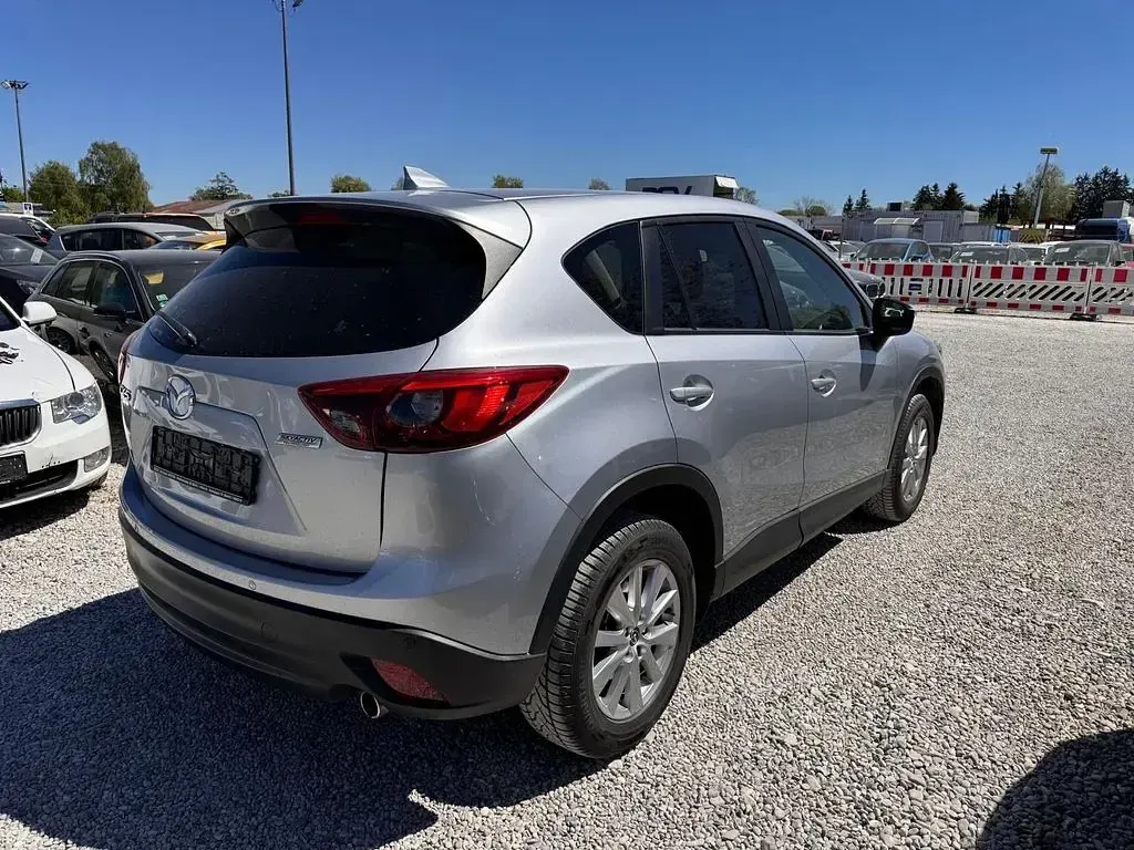 Second-hand Mazda CX-5 Exclusive-Line 150 CP (110 kW) 2015 Argintiu SUV