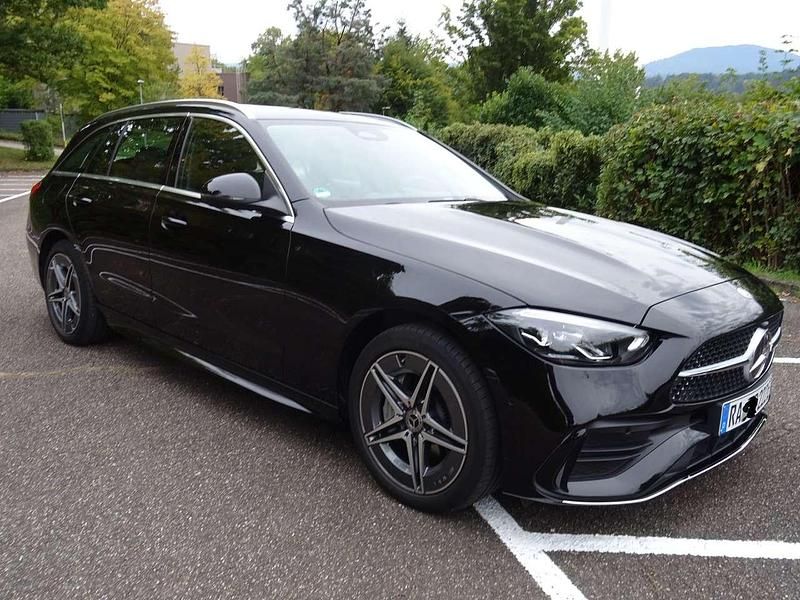 Schwarz Gebraucht 2024 Mercedes C300e AMG line Kombi | 45.950 € (Fairer Preis) - Bild 1/4