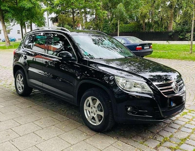 Gebraucht VW Tiguan Team 150 PS (110 kW) 2011 Schwarz SUV