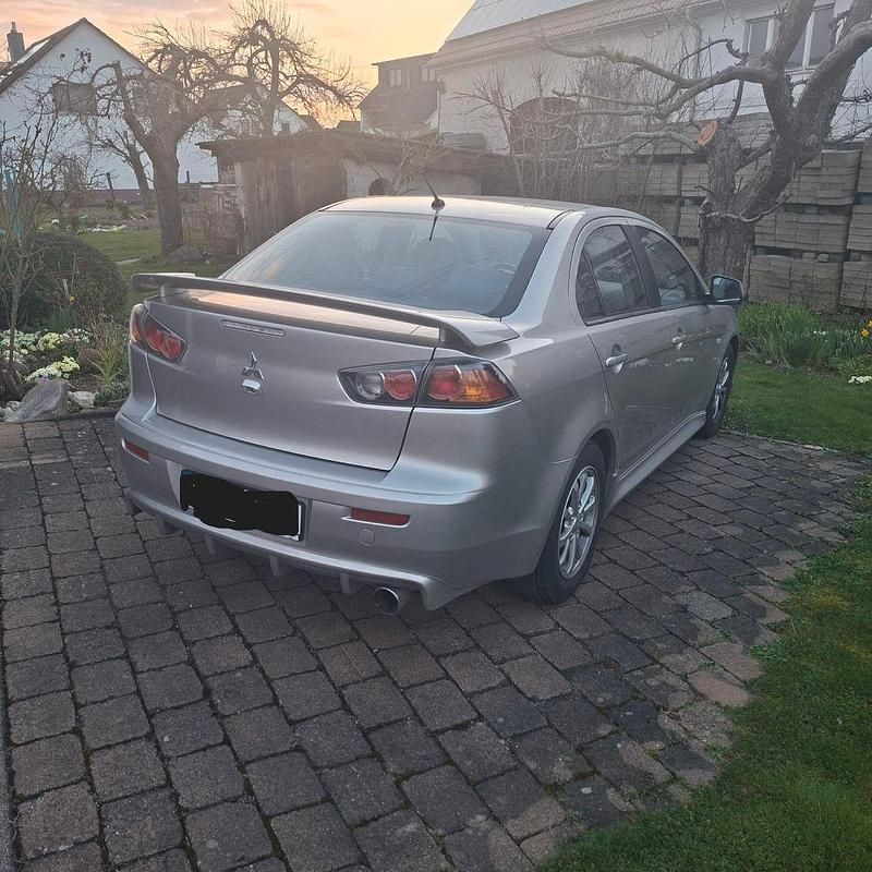 Gebraucht Mitsubishi Lancer 117 PS (86 kW) 2012 Silber Limousine