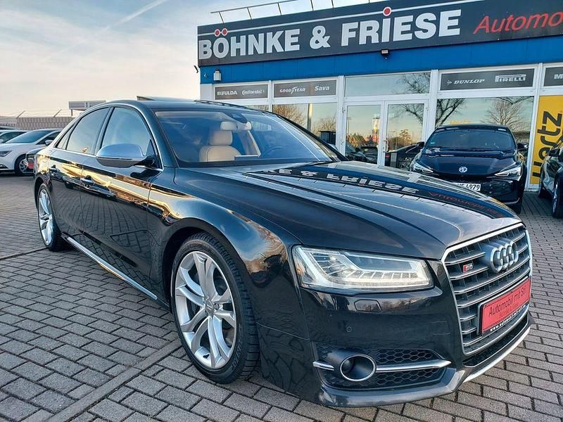 Havannaschwarz metallic Gebraucht 2015 Audi S8 Ambiente Limousine | 31.499 € (Fairer Preis) - Bild 1/4