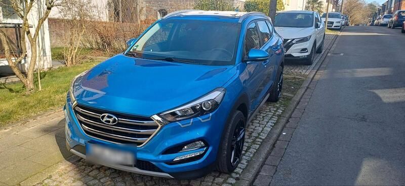 Blau Gebraucht 2017 Hyundai Tucson SUV | 15.500 € (Fairer Preis) - Bild 1/4