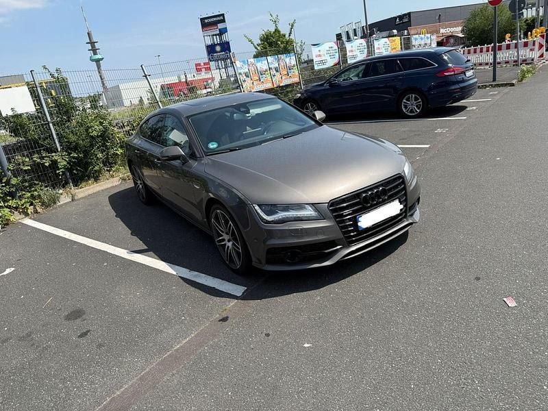 Braun Gebraucht 2012 Audi A7 Coupé | 13.899 € (Guter Preis) - Bild 1/4