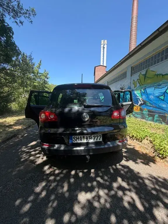 Gebraucht VW Tiguan Team 140 PS (102 kW) 2010 Schwarz SUV