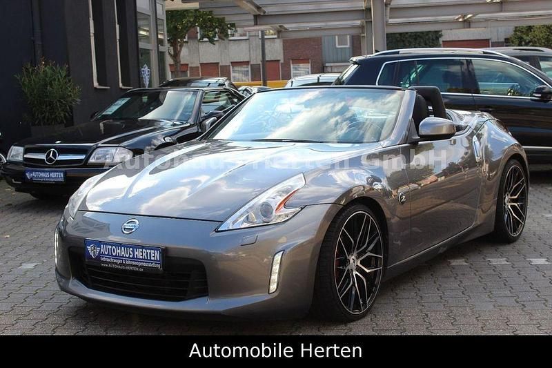 Gun metallic (m) Gebraucht 2013 Nissan 370Z Pack Cabrio | 21.850 € (Teuer) - Bild 1/4