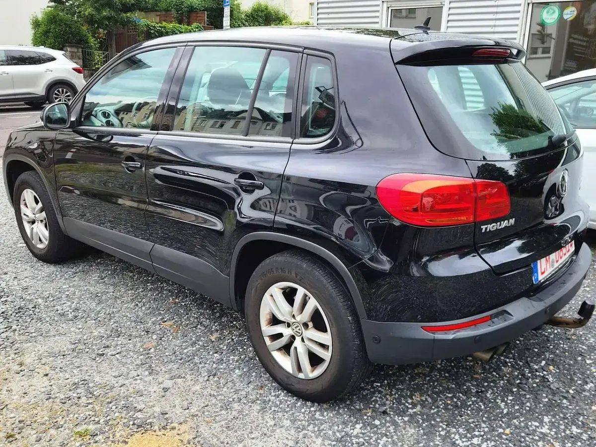 Gebraucht VW Tiguan Trendline 122 PS (89 kW) 2012 Deep black perleffekt SUV