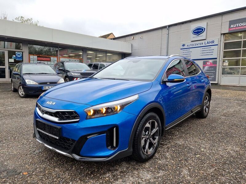 B3l blue flame m Gebraucht 2024 Kia XCeed Exclusive SUV | 28.580 € (Etwas zu teuer) - Bild 1/4