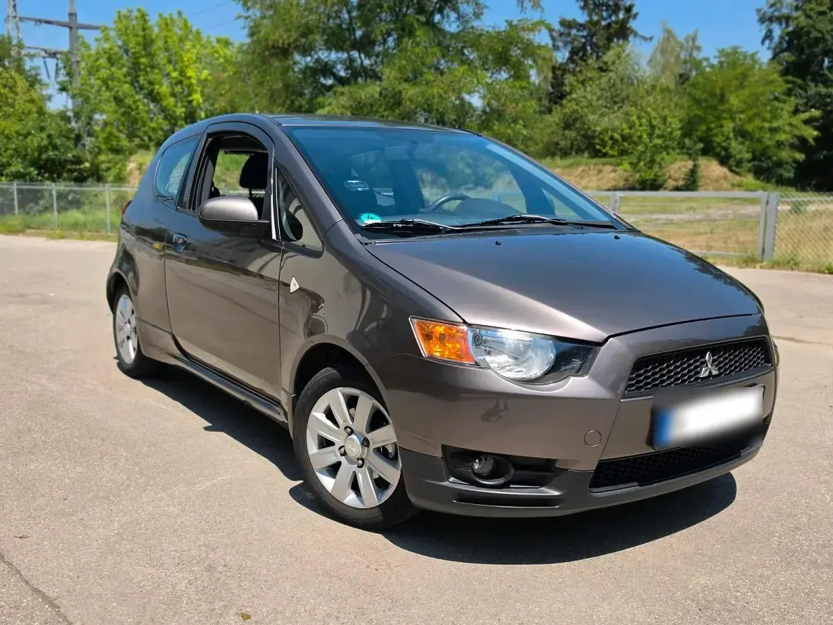 Gebraucht Mitsubishi Colt 75 PS (55 kW) 2012 Braun Kleinwagen