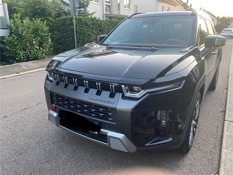 Schwarz Gebraucht 2024 Ssangyong (KGM) Torres SUV | 22.900 € - Bild 1/4