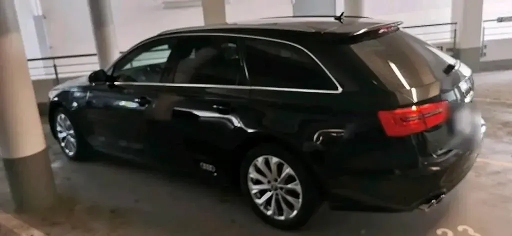 Używany Audi A6 177 KM (130 kW) 2014 Czarny Kombi