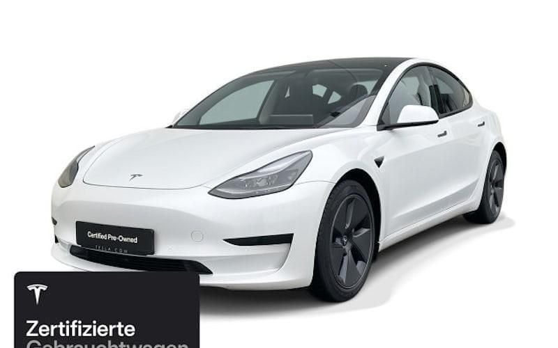 Weiß Gebraucht 2021 Tesla Model 3 Standard Range Limousine | 27.700 € (Fairer Preis) - Bild 1/4