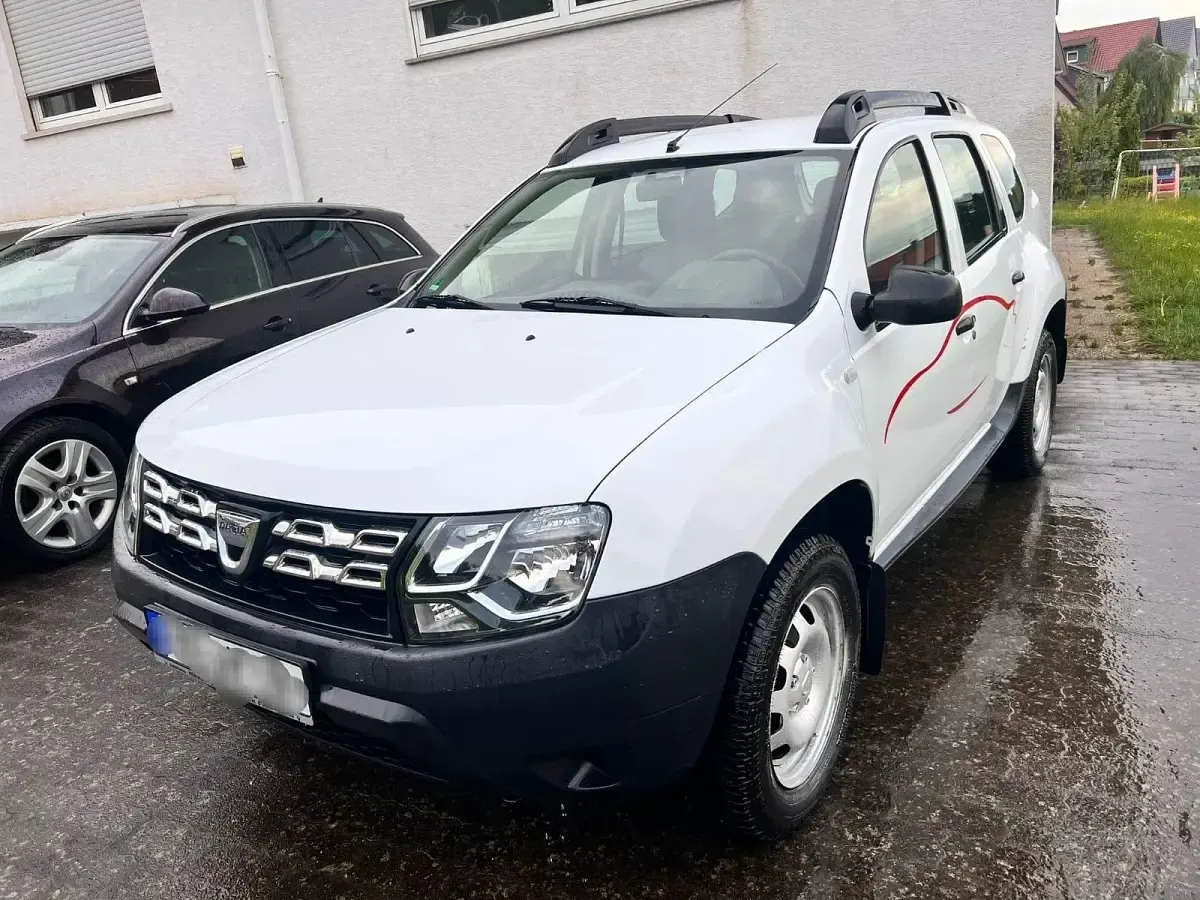 Używany Dacia Duster 102 KM (75 kW) 2014 Biały SUV
