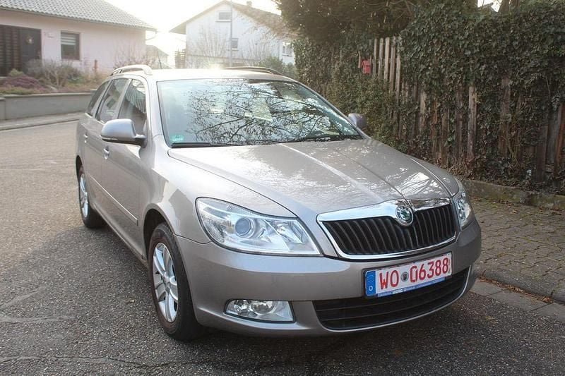 Second-hand Skoda Octavia Impuls Edition 105 CP (77 kW) 2010 Auriu Break