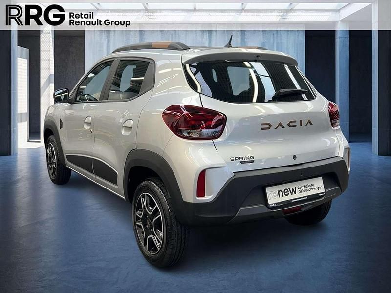 Gebraucht Dacia Spring Extreme 47 kW (65 PS) 2023 Diamantsilbergrau Kleinwagen