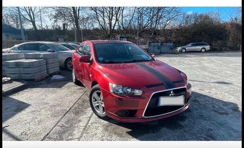 Gebraucht Mitsubishi Lancer 143 PS (105 kW) 2009 Rot Limousine