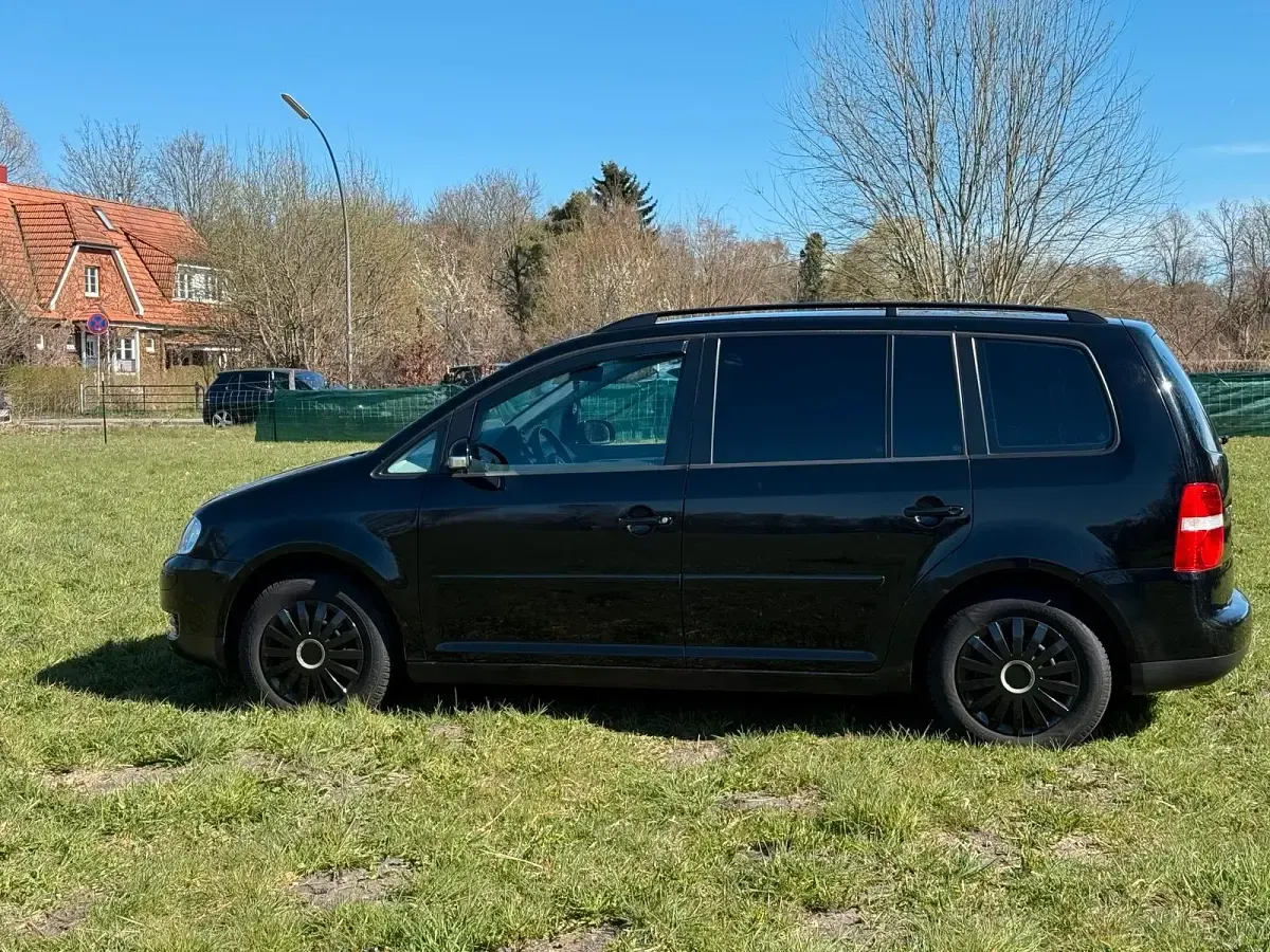 Używany VW Touran 120 KM (88 kW) 2006 Czarny Minivan