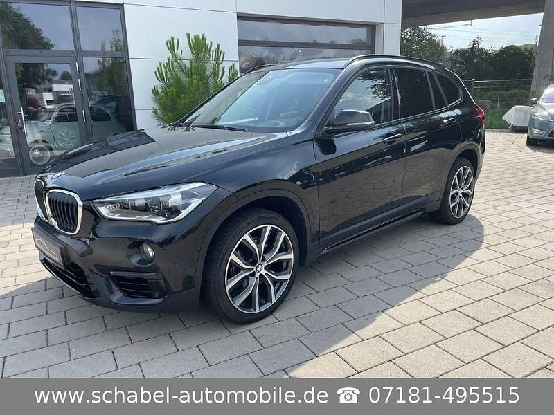 Schwarz (metallic) Gebraucht 2019 BMW X1 Sport Line SUV | 21.900 € (Fairer Preis) - Bild 1/4
