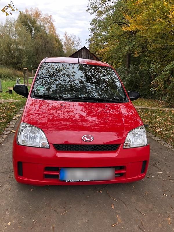 Gebraucht Daihatsu Cuore 58 PS (42 kW) 2004 Rot Kleinwagen