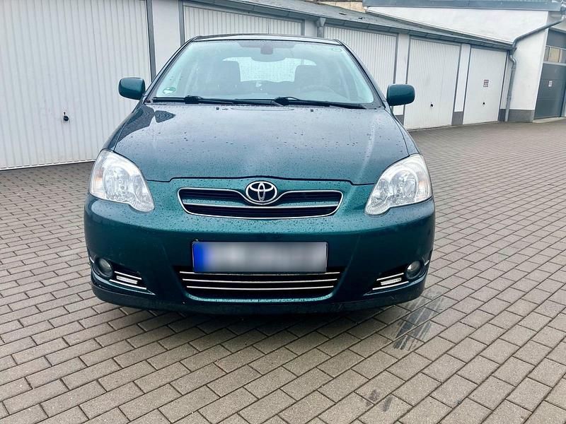 Usado Toyota Corolla 97 HP (71 kW) 2005 Verde Sedan
