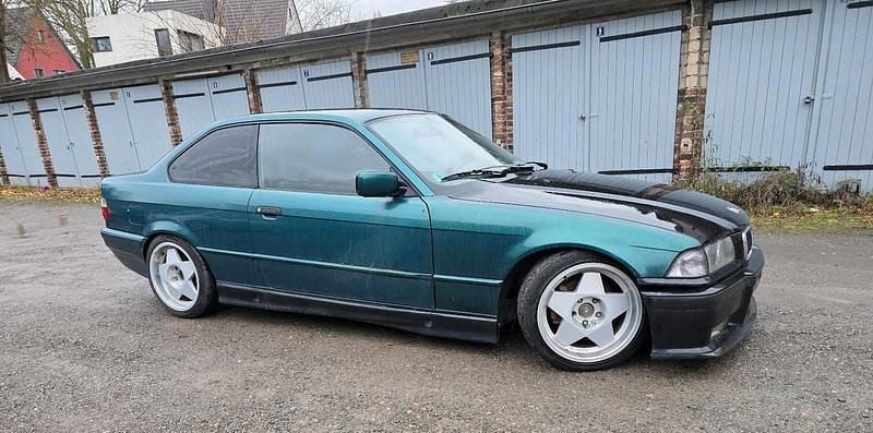 Second-hand BMW 320 Basis 150 CP (110 kW) 1992 Verde Coupe