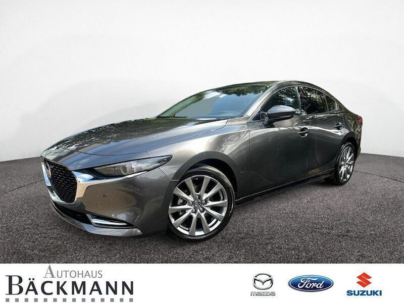 Grau (grau / machine gray) Neu 2024 Mazda 3 Exclusive-Line Limousine | 31.950 € (Fairer Preis) - Bild 1/4