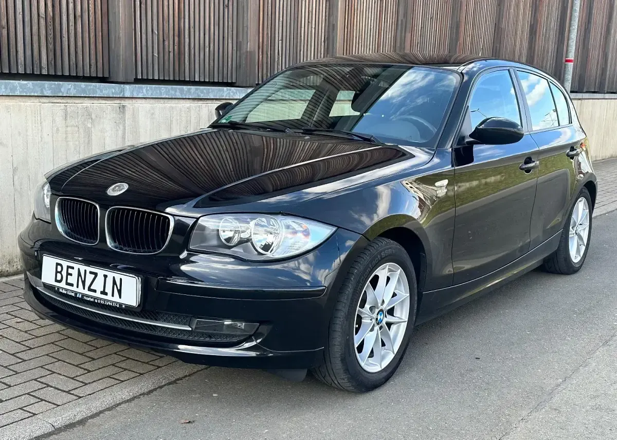 Usata BMW 116 122 CV (89 kW) 2009 Nero Utilitaria