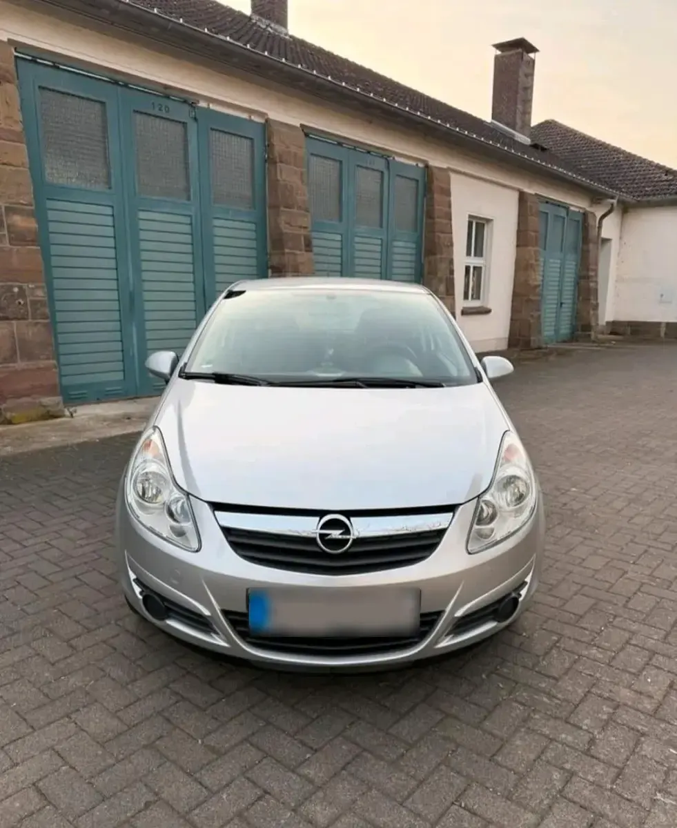 Usado Opel Corsa 80 HP (58 kW) 2009 Prateado Citadino
