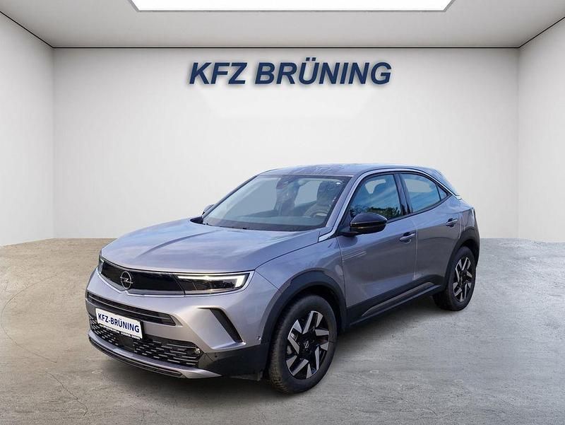Kontrast grau metallic (metallic) Gebraucht 2023 Opel Mokka-e Elegance SUV | 18.880 € (Guter Preis) - Bild 1/4