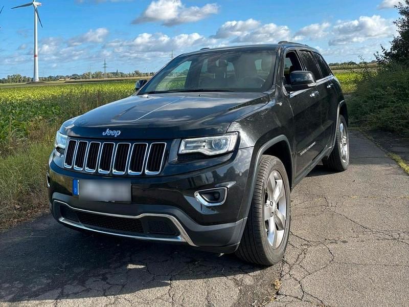 Schwarz Gebraucht 2013 Jeep Grand Cherokee SUV | 15.495 € - Bild 1/4