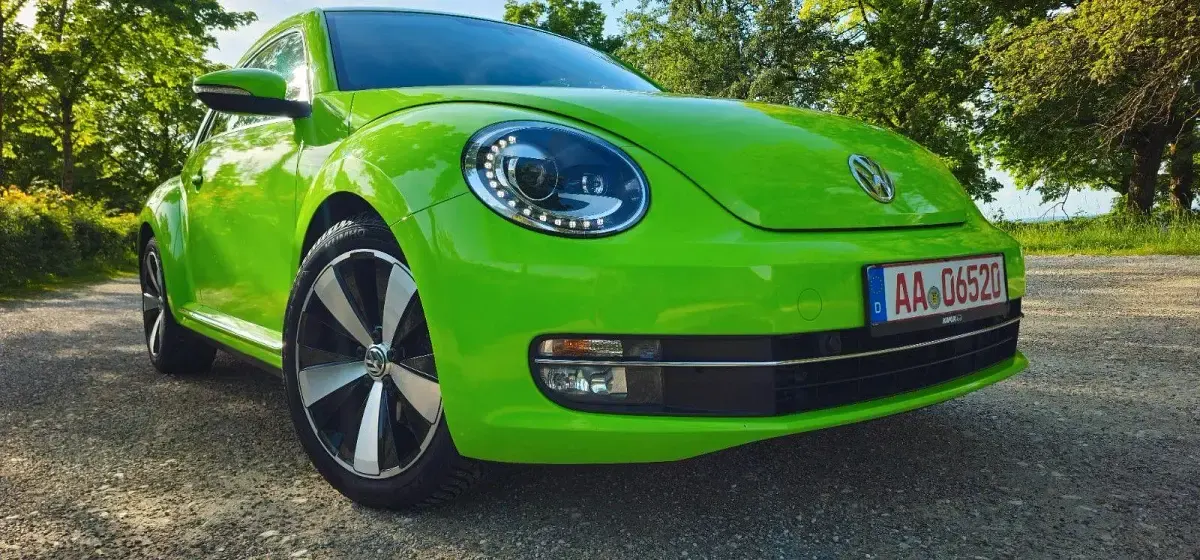 Gebraucht VW Beetle Exclusive 105 PS (77 kW) 2013 Grün Kleinwagen
