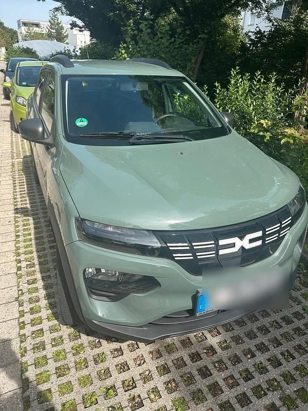 Grün Gebraucht 2023 Dacia Spring Kleinwagen | 11.790 € (Guter Preis) - Bild 1/4
