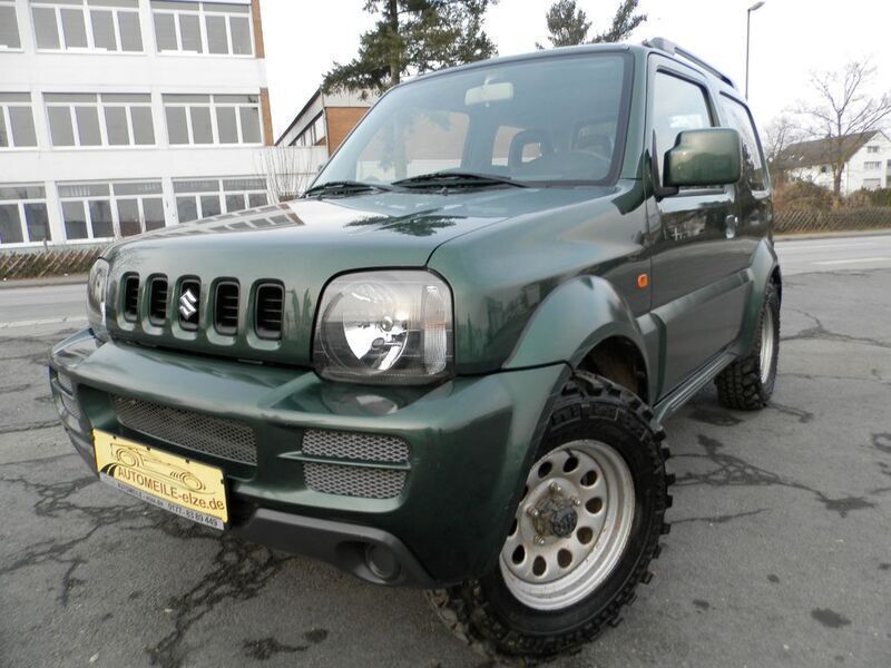 Grün Gebraucht 2012 Suzuki Jimny Ranger SUV | 9.900 € (Fairer Preis) - Bild 1/4