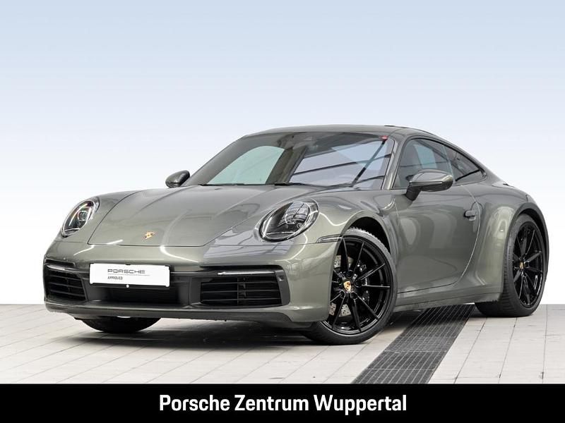 Gruen Gebraucht 2024 Porsche 911 Carrera S Coupé | 136.400 € (Fairer Preis) - Bild 1/4