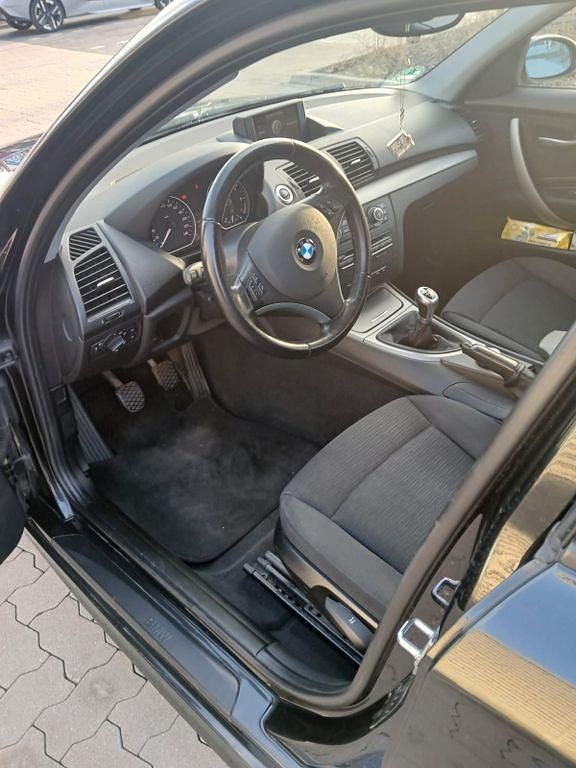 Second-hand BMW 116 122 CP (89 kW) 2007 Negru Hatchback