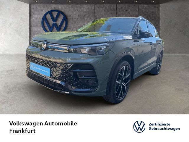Cipressinogrün metallic Gebraucht 2025 VW Tiguan R-line SUV | 60.850 € - Bild 1/4
