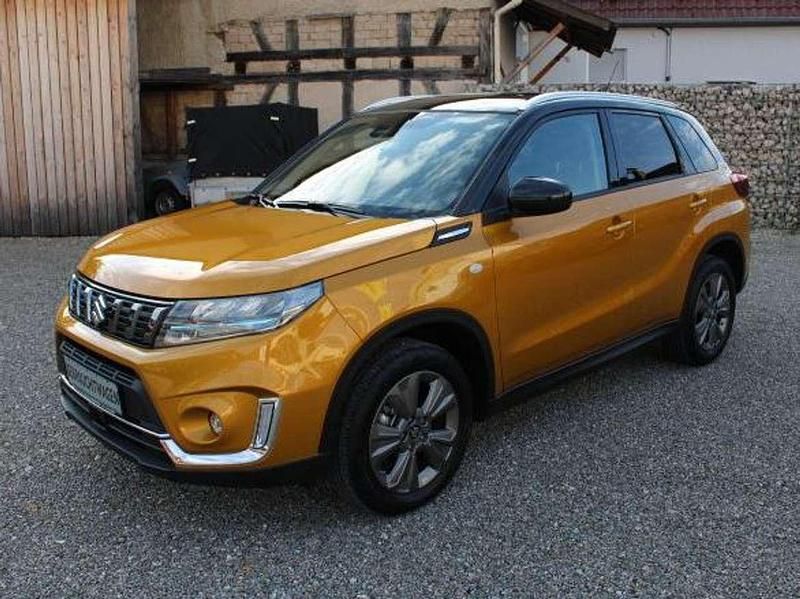 Solar yellow/cosmic black Gebraucht 2024 Suzuki Vitara Comfort SUV | 25.250 € (Guter Preis) - Bild 1/4