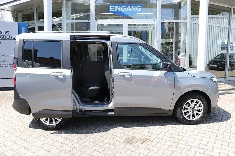 Gebraucht Ford Tourneo Courier Titanium 125 PS (91 kW) 2024 Silber Van / Kleinbus